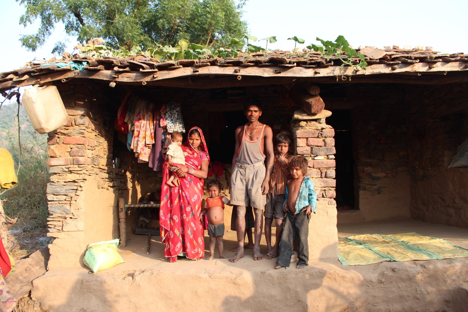 Family in front of their house